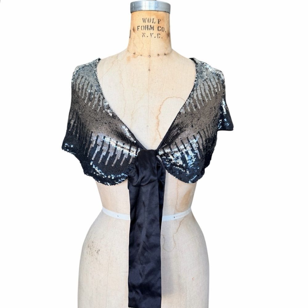 Marciano Cape Sleeves Black and Silver Sequin Fabric
One Size